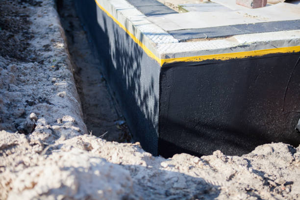 Professional Waterproofing technician working in Bristol, WI